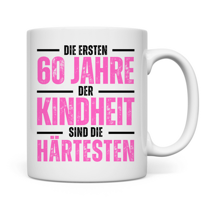 Tasse "Die ersten 60 Jahre der Kindheit sind die härtesten" (Pink)