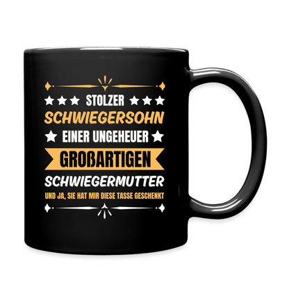 Tasse "Stolzer Schwiegersohn einer ungeheuer großartigen Schwiegermutter" - Schwarz