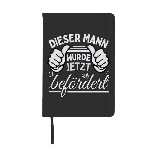 Notizbuch "Dieser Mann wurde jetzt befördert"