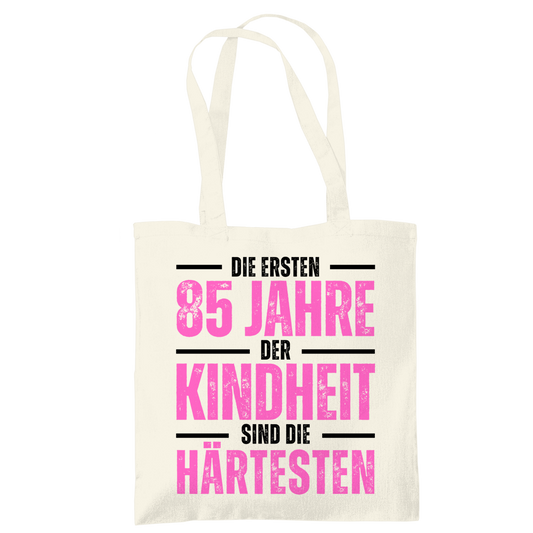 Tragetasche "Die ersten 85 Jahre der Kindheit" (Pinkes Motiv)