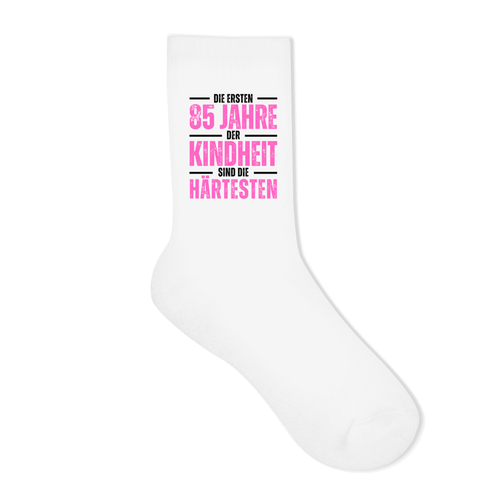Socken "Die ersten 85 Jahre der Kindheit" (Pinkes Motiv)