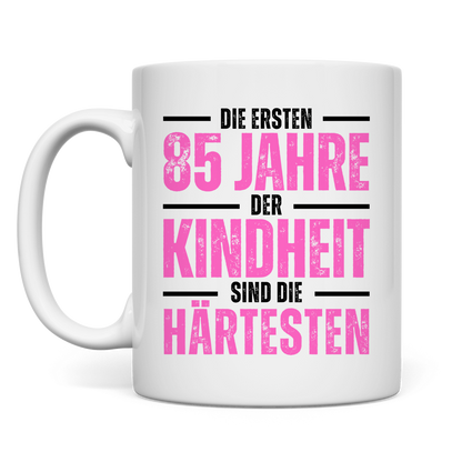 Tasse "Die ersten 85 Jahre der Kindheit" (Pinkes Motiv)
