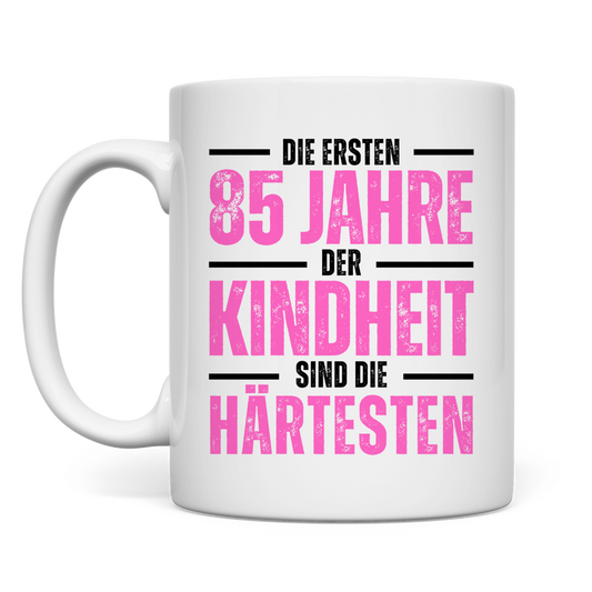 Tasse "Die ersten 85 Jahre der Kindheit" (Pinkes Motiv)