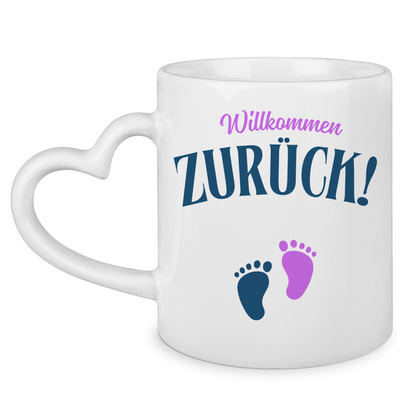 Tasse mit Herzhenkel "Willkommen zurück" (Babyfüße)