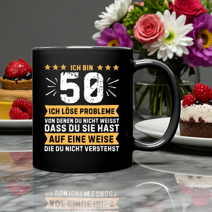 Tasse "Ich bin 50 - Ich löse Probleme von denen du nicht weisst..." (Orangenes Motiv)