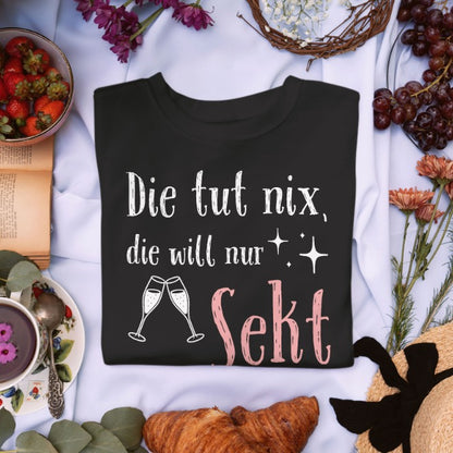 Frauen T-Shirt "Die tut nix, die will nur Sekt"