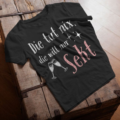 Frauen T-Shirt "Die tut nix, die will nur Sekt"