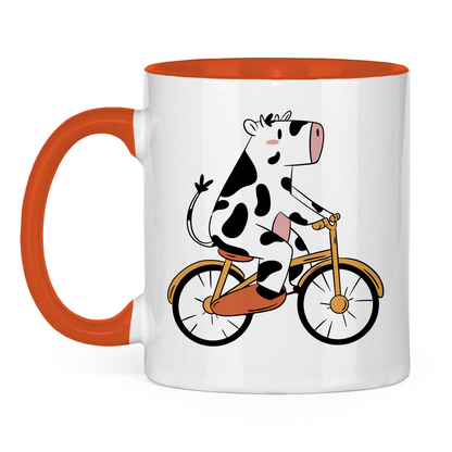 Tasse zweifarbig "Kuh mit Fahrrad"
 Orange
