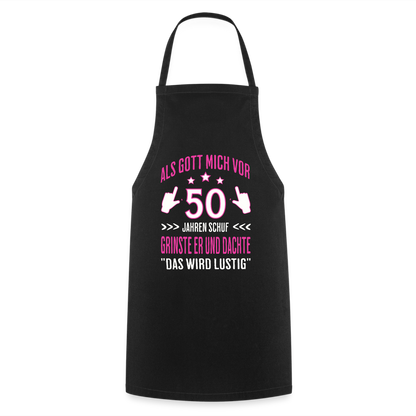 Kochschürze "Als Gott mich vor 50 Jahren schuf, grinste er" (Pinkes Motiv) - Schwarz