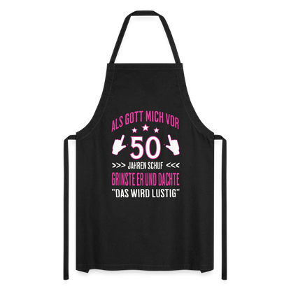 Kochschürze "Als Gott mich vor 50 Jahren schuf, grinste er" (Pinkes Motiv) - Schwarz